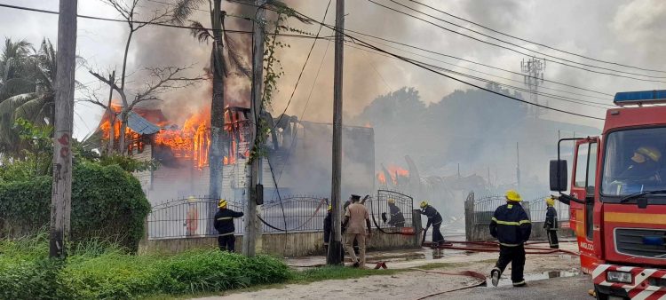 Firemen battling the blaze today.