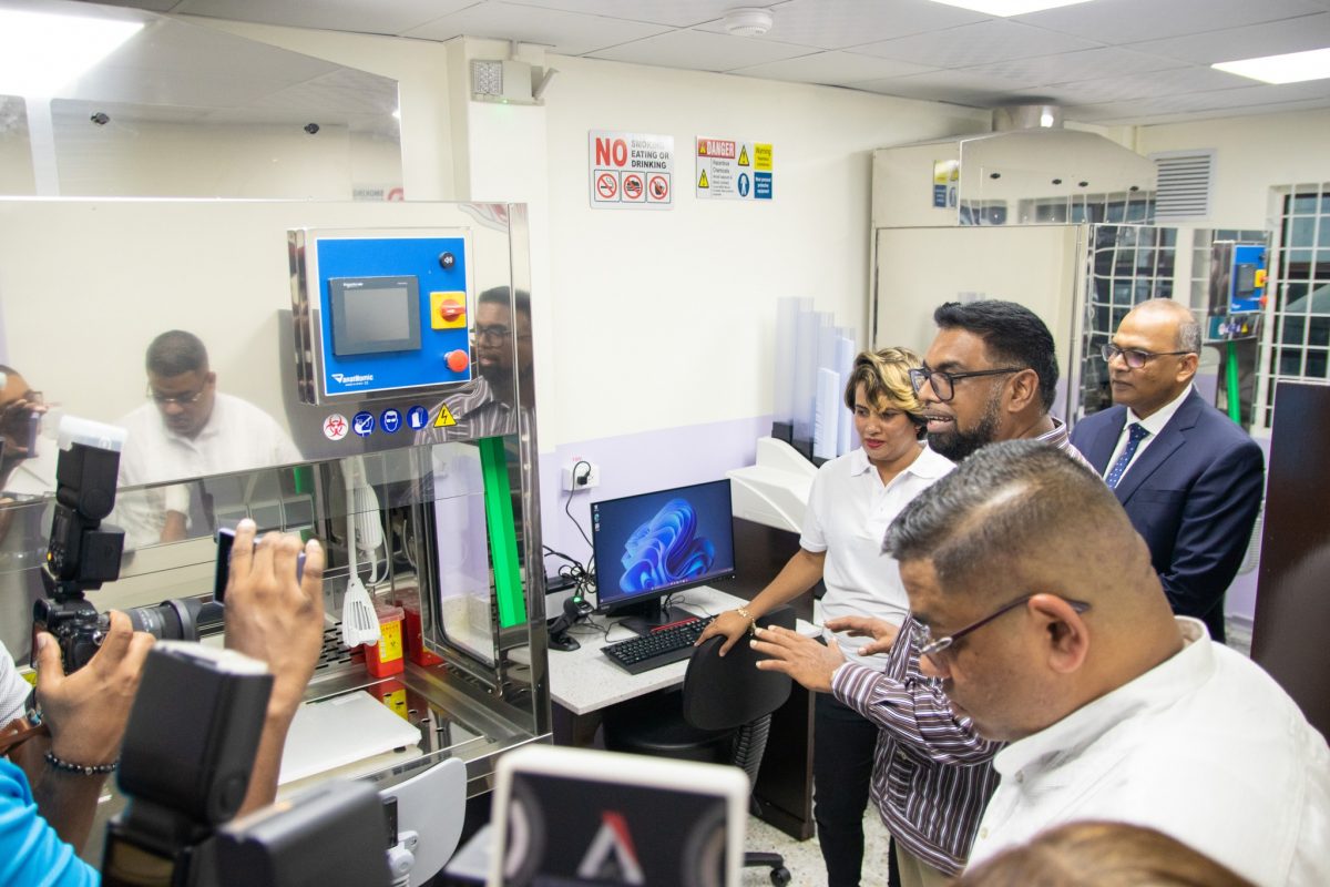 President Irfaan Ali touring the lab today (Ministry of Health photo)