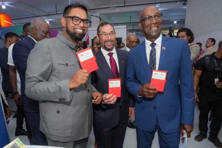 President Irfaan Ali (left) with Trinidadian Prime Minister Keith Rowley (right) and Trinidadian Energy Minister Stuart Young