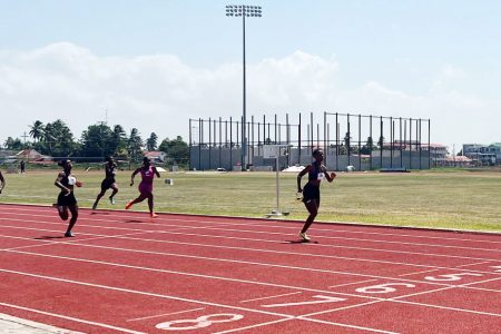 Nalicia Glen powers over the finish line in the Girl’s 100m.