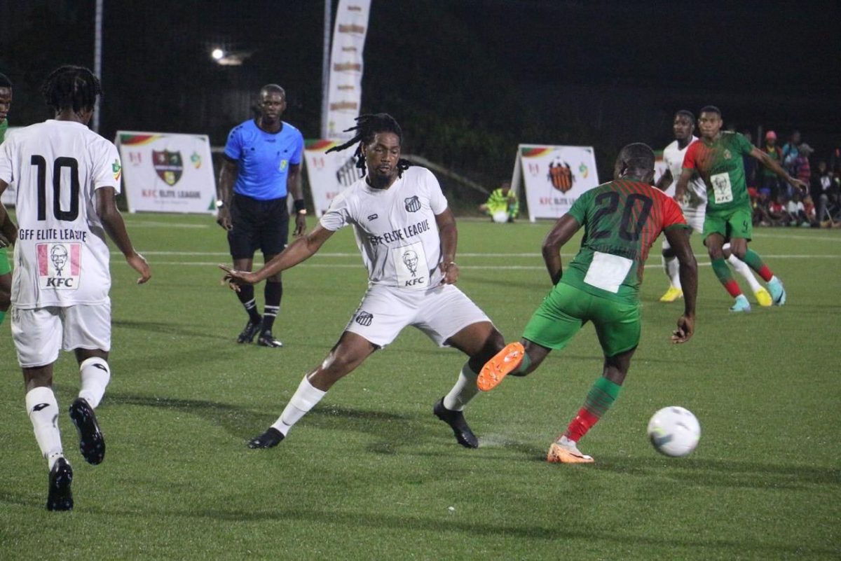 A scene from the Santos (white) and defending champion GDF encounter in the GFF Elite League