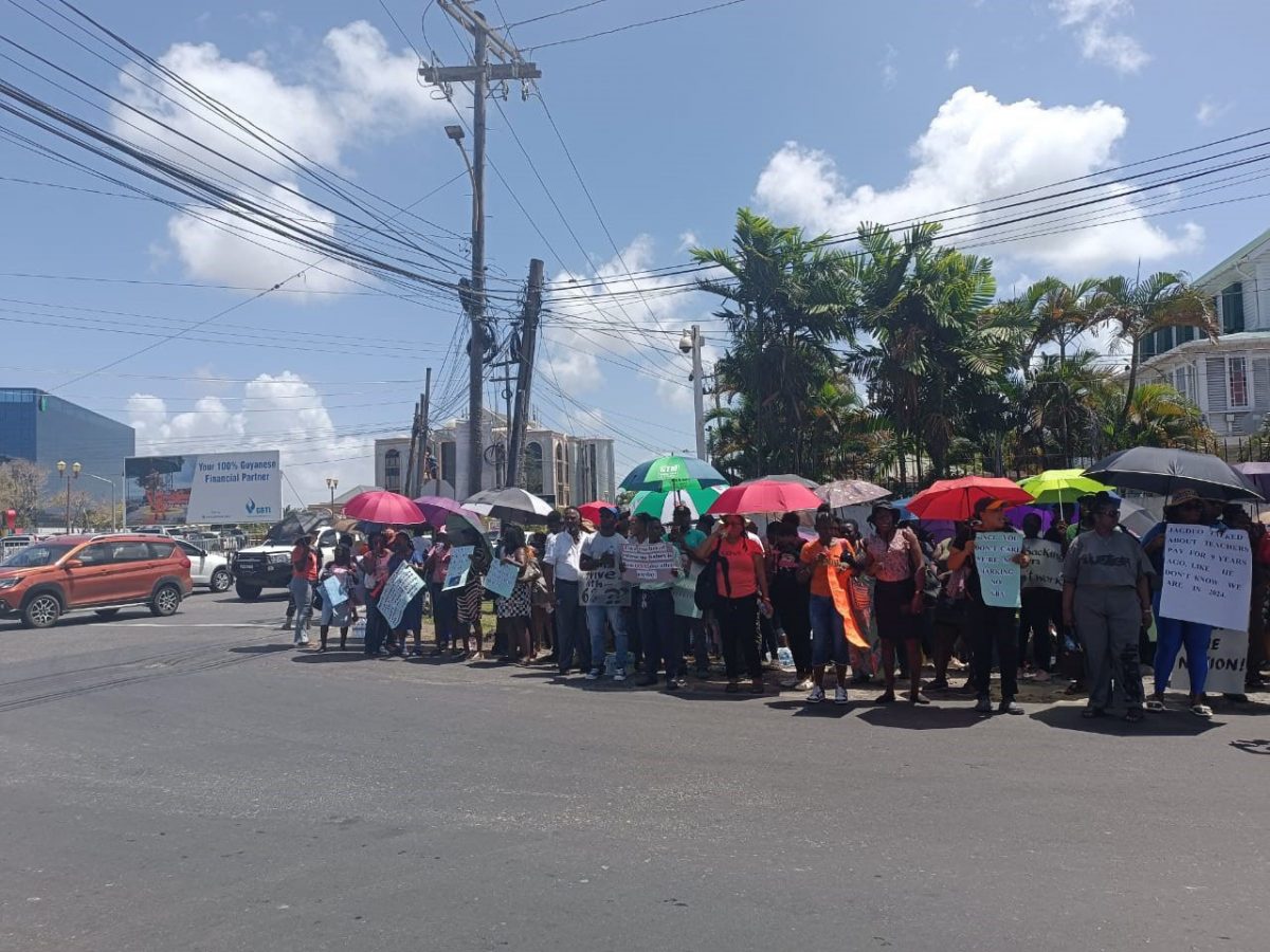  A portion of the striking teachers on High Street yesterday. Despite reports of dwindling numbers, teachers of Georgetown were still seen taking up both sides of the road as they made their voices heard.  (GTU Day 13)