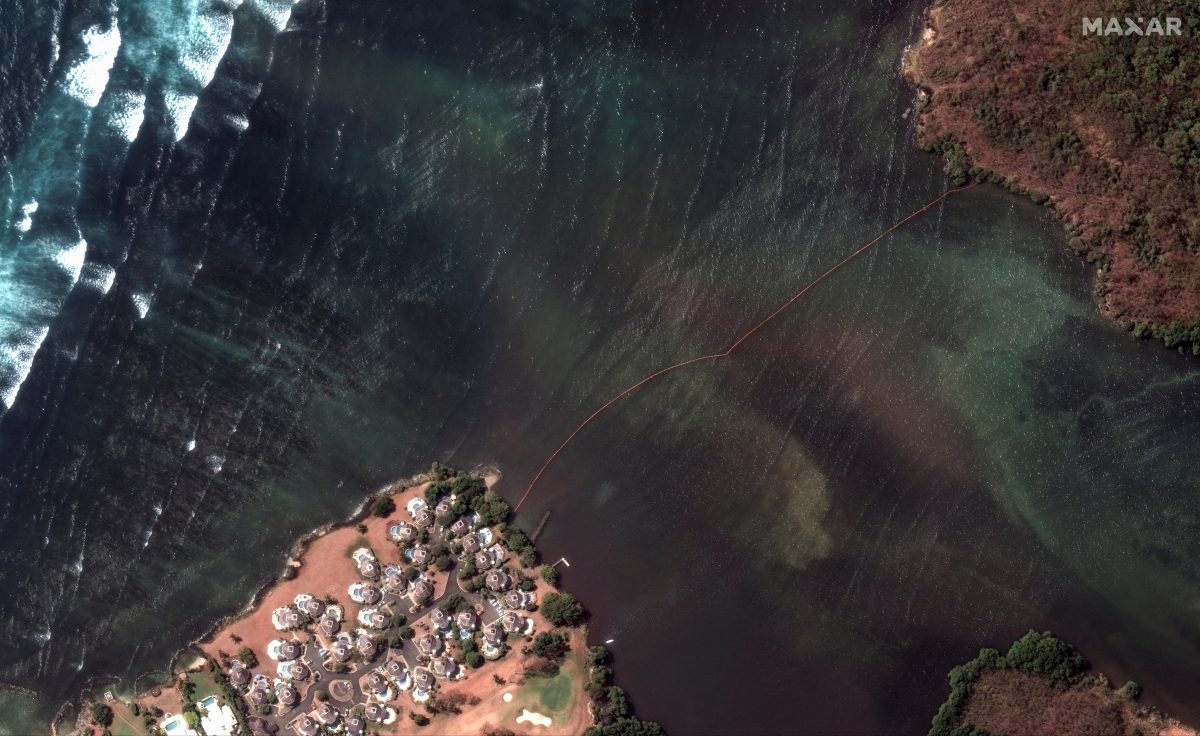 A satellite image shows an oil containment boom across Petit Trou Lagoon, off the shore of Tobago Island, Trinidad and Tobago, February 14, 2024. Maxar Technologies/Handout via REUTERS/ File photo