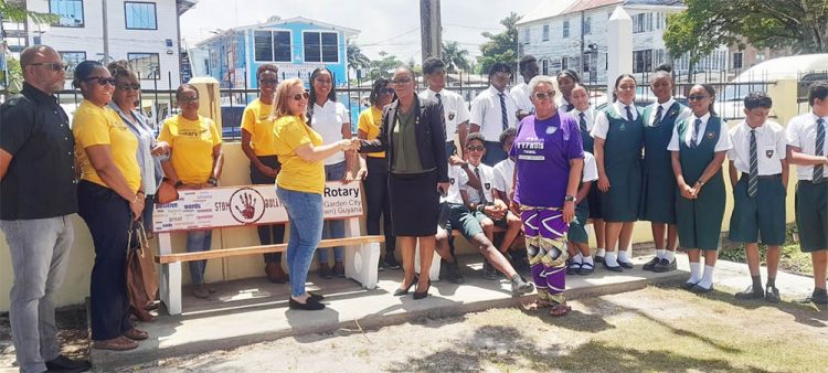 Members of the Rotary Club of Garden City Georgetown, students and teachers at the installation at the Bishops’ High School