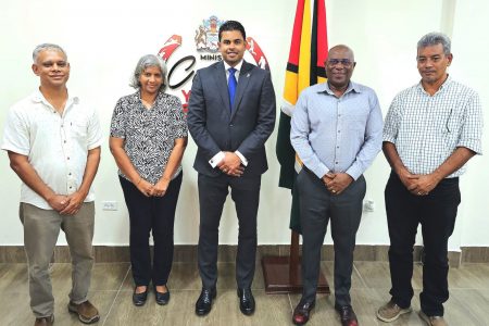 Members of the Guyana Chess Federation posing alongside Minister of Culture, Youth, and Sport Charles Ramson (centre) and Director of Sports Steve Ninvalle (2nd from right)
