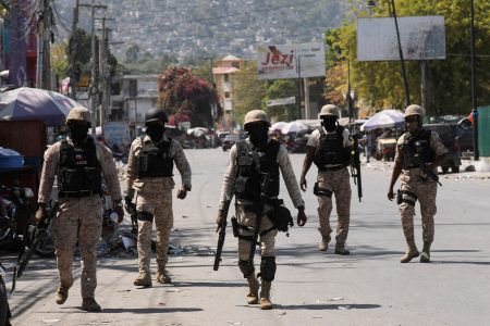 FILE PHOTO: Police patrol a street after authorities extended the state of emergency amid gang violence that has threatened to bring down the government, forcing thousands to flee their homes, in Port-au-Prince, Haiti March 8, 2024. REUTERS/Ralph Tedy Erol/File Photo