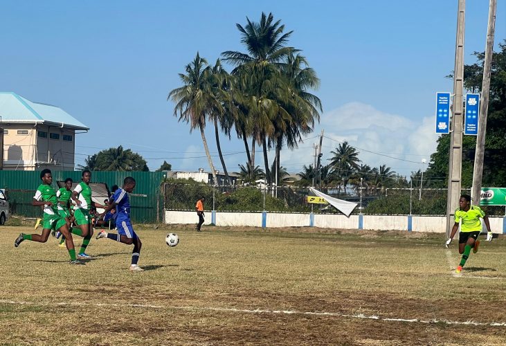 Action in the Milo Schools U-18 Football Championship at the Ministry of Education ground on Carifesta Avenue