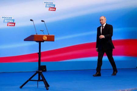 Russian presidential candidate and incumbent President Vladimir Putin arrives to speak after polling stations closed on the final day of the presidential election, in Moscow, Russia, March 17, 2024.