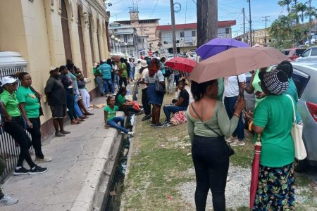  Striking teachers waited patiently outside the High Court yesterday as mediation talks ensued (GTU photo).