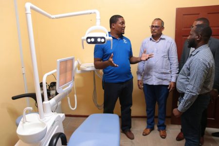 Inside the dental unit. Health Minister Dr Frank Anthony is second from left (Ministry of Health photo)