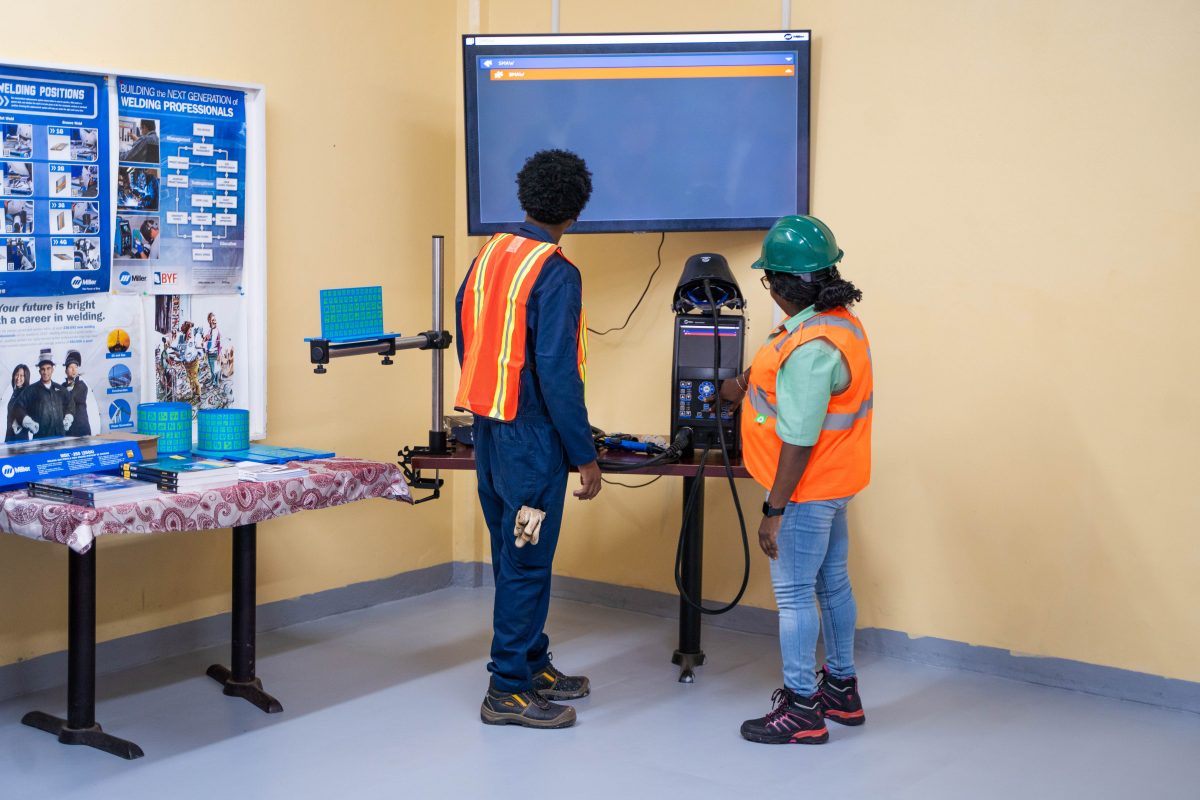 A demonstration of the Augmented Reality Welding Simulation System facilitated by an instructor and student