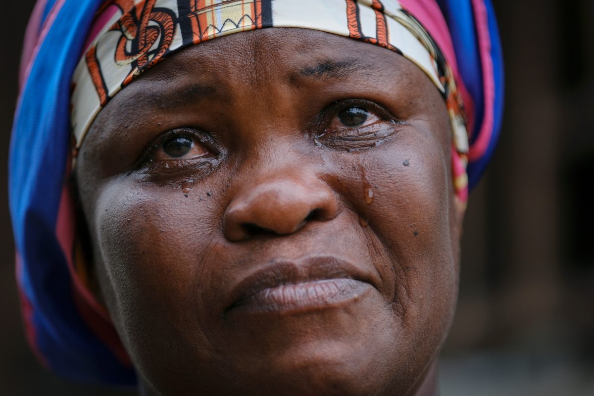 Janet Gyamfi, 52, a cocoa farmer, cries at her home as she recounts the destruction of her cocoa plantation by illegal gold mining activities in the Samreboi community in the Western Region, Ghana, February 26, 2024. Surveying the stripped landscape of her farm – dotted with pools of cyanide-tainted, tea coloured waste water left by illegal gold miners – is enough to make Gyamfi break down. Only last year, the 27-hectare plot in western Ghana was covered with nearly 6,000 cocoa trees. Today, less than a dozen remain. “This farm was my only means of survival,” the divorcee told Reuters, tears streaming down her cheeks. “I planned to pass it on to my children.”        REUTERS/Francis Kokoroko        SEARCH “KOKOROKO GHANA COCOA” FOR THIS STORY. SEARCH “WIDER IMAGE” FOR ALL STORIES.