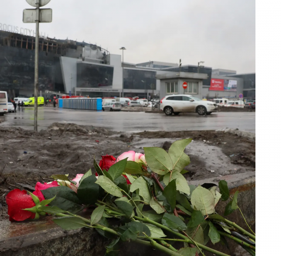 Flowers are seen left at the scene of the gun attack at the Crocus City Hall concert hall in Krasnogorsk, outside Moscow. Photograph: AFP/Getty Images