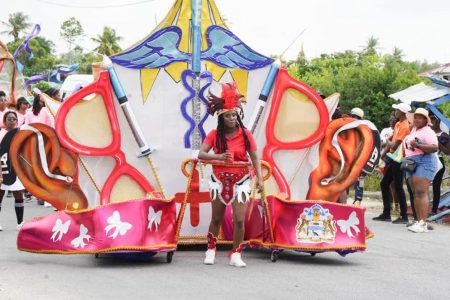  Part of a float that made up the parade for the Berbice mash celebration yesterday which saw scores of persons lining the streets to view the different float display. (DPI photo)
