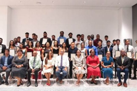 The graduates pose with Minister of Health Dr Frank Anthony and other officials (DPI photo)
