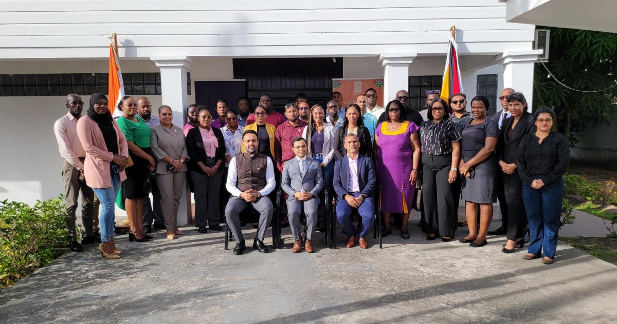 Indian High Commissioner, Dr Amit Telang (seated at centre) with the Guyanese selected for the course and officials of the Indian High Commission. 