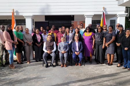 Indian High Commissioner, Dr Amit Telang (seated at centre) with the Guyanese selected for the course and officials of the Indian High Commission. 