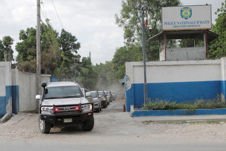 FILE PHOTO: A convoy of cars carrying members of a Kenyan delegation leave the premises of Haitian National Police (PNH) after meeting with the Chief of the Haitian National Police Frantz Elbe, in Port-au-Prince, Haiti, August 21, 2023. REUTERS/Ralph Tedy Erol/File Photo