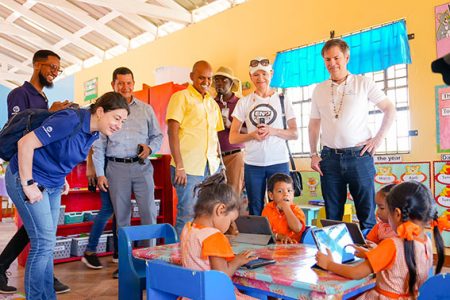 World Bank Regional Vice-President for Latin America and the Caribbean, Carlos Felipe Jaramillo (standing at right) with others at the Parishara Nursery. (Ministry of Education photo)