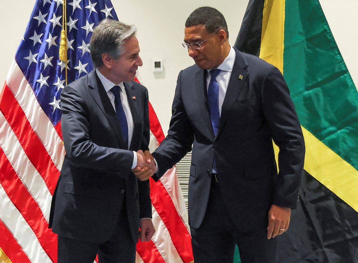 U.S. Secretary of State Antony Blinken and Jamaican Prime Minister Andrew Holness shake hands at the Pegasus Hotel in Kingston, Jamaica, March 11, 2024. REUTERS/Gilbert Bellamy