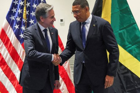 U.S. Secretary of State Antony Blinken and Jamaican Prime Minister Andrew Holness shake hands at the Pegasus Hotel in Kingston, Jamaica, March 11, 2024. REUTERS/Gilbert Bellamy