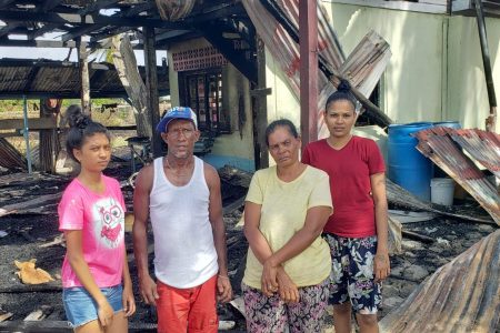 Family members with the ruins in the background