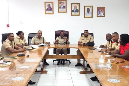 Top Cop Clifton Hicken (centre) and his senior officers in the Commissioner’s Conference Room at Eve Leary yesterday meeting to finalise security plans for the long Easter holiday weekend and the Rupununi Rodeo 2024 in Lethem. (Police photo)