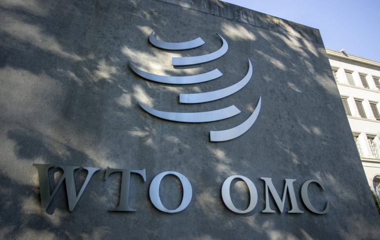 FILE PHOTO: A logo is seen at the World Trade Organization (WTO) headquarters before a news conference in Geneva, Switzerland, October 5, 2022. REUTERS/Denis Balibouse/File Photo