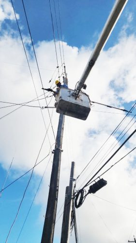 A GPL workman fixing the burst-wire