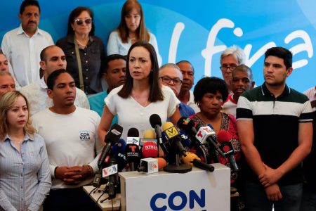Venezuelan opposition leader Maria Corina Machado, who is barred from holding public office, addresses the media after Venezuela’s opposition coalition failed to register a candidate to run in the country’s July presidential election, in Caracas, Venezuela March 26, 2024. (Reuters photo) 