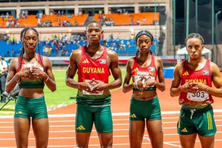 Guyana’s 4x400m Mixed Relay team of (from right) Dhanielson Gill, Tianna Springer, Malachi Austin, and Narissa McPherson, which smashed the record enroute to gold