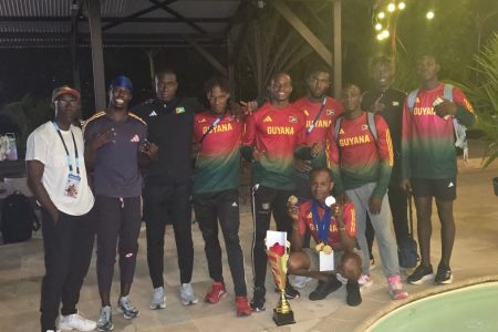 The Guyanese contingent poses with their hardware after the Guiana Games in French Guiana yesterday