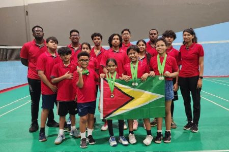 Team Guyana posing with their spoils following the conclusion of the event
