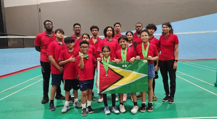 Team Guyana posing with their spoils following the conclusion of the event
