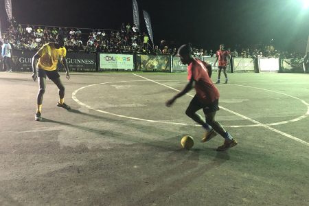 A scene from the Guinness ‘Greatest of the Streets’ Berbice final between Trafalgar (red) and East Bank Gunners
