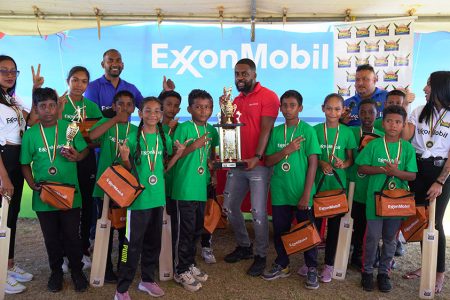 The victorious Huis T’ Dieren posing with their spoils after being crowned the Essequibo Champion in the Future Warriors Primary Schools Tape-ball Cricket Tournament
