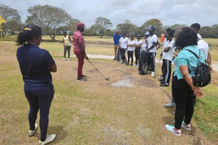 Students of Belladrum Secondary being attentive during a practical golf session at the Lusignan Facility
