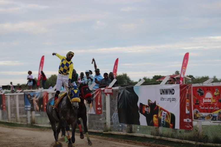 Jockey Ronaldo Appadu caused a major upset as Stolen Money (left) defeated the vaunted Spankhurst in the feature event 