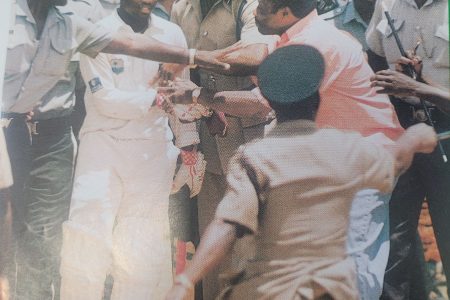Laramania! Brian Lara is protected by a cordon of Antiguan
policemen moments after he passed Sir Garry Sobers’ Test
record of 365 (Source: Red Stripe Caribbean Cricket Quarterly
Volume 4 Number 3, July/September, 1994)
