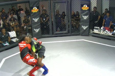 A scene from the Deanna Dujon (right) and Crystal Murray encounter which was won by the former via TKO
