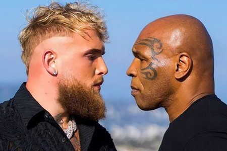 Mike Tyson (right) and Jake Paul
