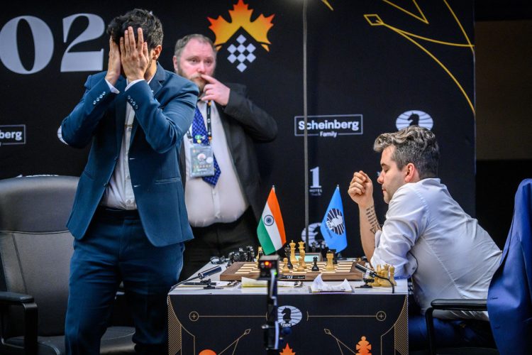 Vidit Gujrathi of India (left) reacts following his loss to Russian grandmaster Ian Nepomniachtchi (Photo: FIDE/Michal Walusza)
