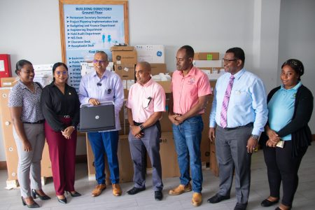 Minister of Health Dr Frank Anthony (third from left) at the handing over (Ministry of Health photo)