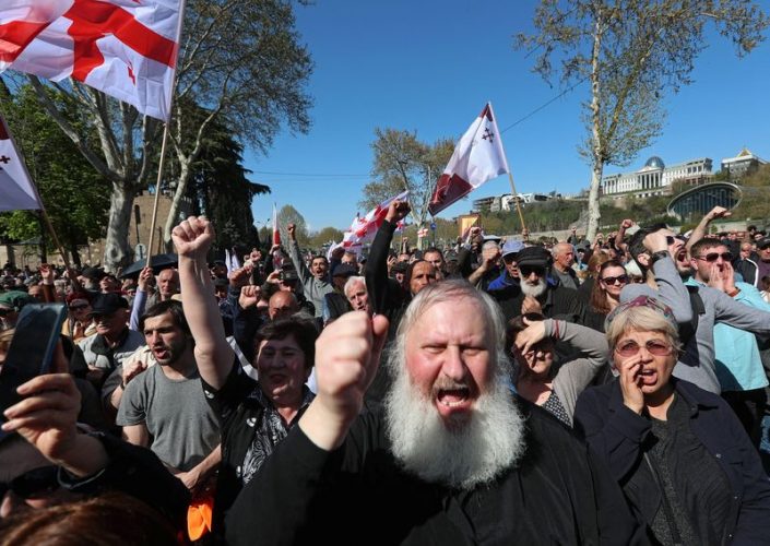 Supporters of the pro-Russian Conservative Movement/Alt-info party take part in a protest outside the office of the ruling Georgian Dream party in Tbilisi, Georgia April 13, 2024. REUTERS/Irakli Gedenidze/File Photo