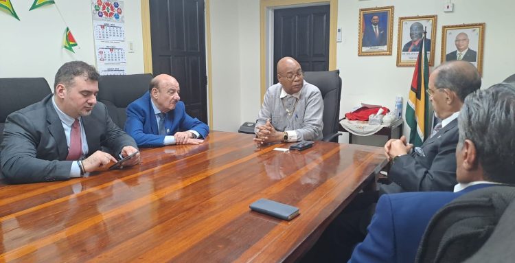 The  meeting. Minister of Public Works Juan Edghill is at the head of the table.  (Ministry of Public Works photo)
