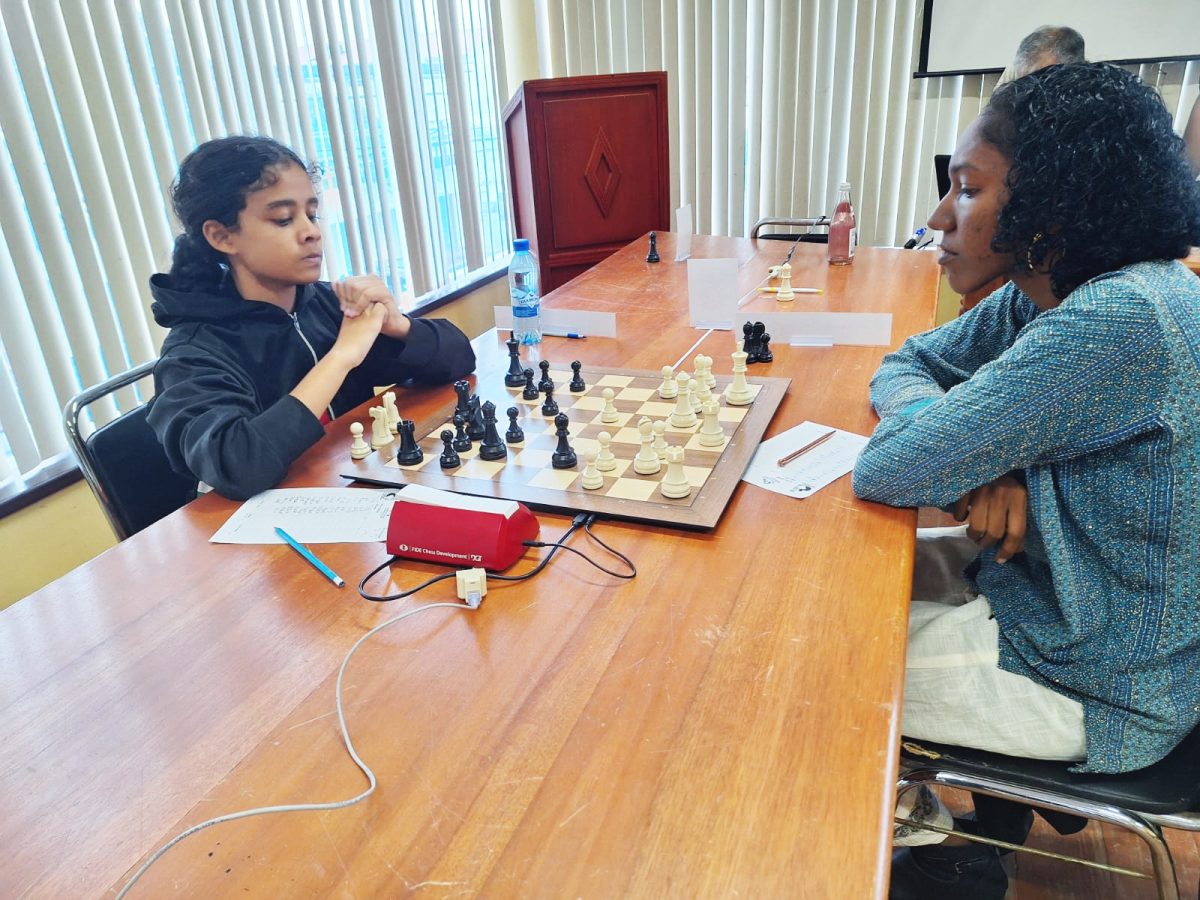 The round 9 battle between Jessica Callender (right) and Aditi Joshi (left) lasted four hours, with defending champion Callender retaining her title after a hard-fought victory