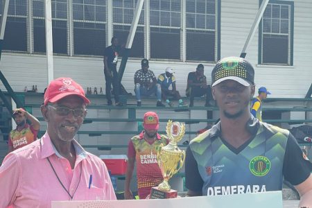 Man of the Match Junior Sinclair (right) receiving his accolade
