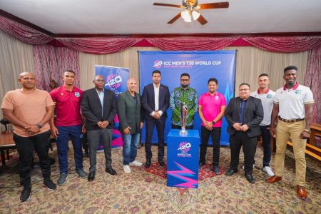 President Dr. Irfaan Ali (centre) last evening hosted the ICC Men’s T20 World Cup trophy at State House. He was joined by the ICC T20 World Cup’s Head of PR and Communications, Damon Leon (4th from left), Minister of Culture, Youth, and Sport, Charles Ramson Jr. (5th from left), Director of Sport Steve Ninvalle (3rd from left), former cricketer Ramnaresh Sarwan (4th from right), and current West Indies players, Tevin Imlach (2nd from left), Kevin Sinclair (1st from right), and Tagenarine Chanderpaul (2nd from right).
