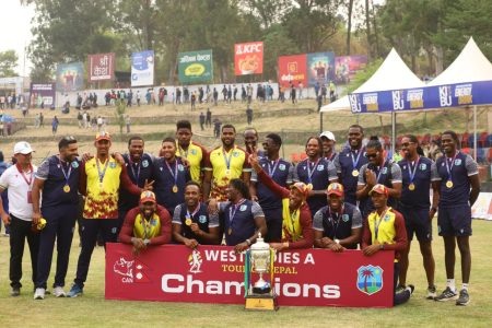 West Indies posing with the championship trophy after defeating Nepal 3-2 in the series despite losing the final encounter