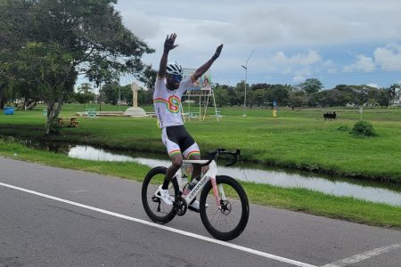  Briton John celebrates after crossing the finish line on Carifesta Avenue to clinch the second stage of the NSC Independence 3-Stage cycling road race. John was unstoppable across the first two stages of the event, turning in record-breaking times. (Michelangelo Jacobus photo)
